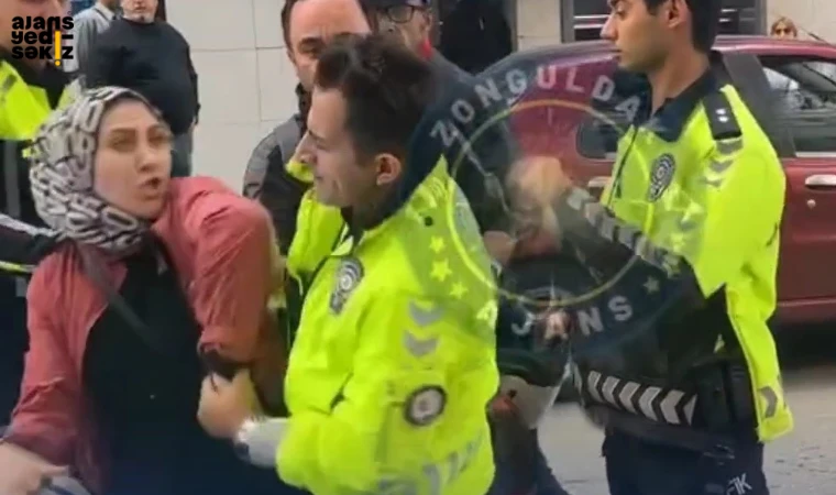 Zonguldak’ta bir kadın, eşine ceza yazmak isteyen polislere karşı direndi.