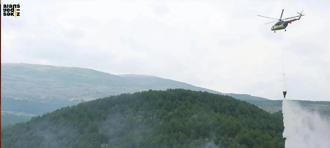 Sipahiler köyü yakınlarında çıkan orman yangınına havadan ve karadan müdahale ediliyor.