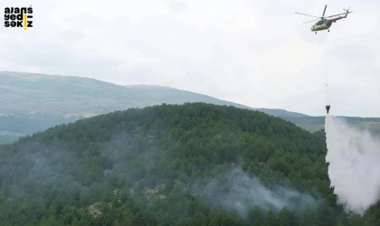 Sipahiler köyü yakınlarında çıkan orman yangınına havadan ve karadan müdahale ediliyor.